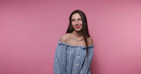 Emotional expression captured in bright setting with model in casual attire Stock Footage 316182816