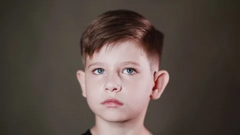 Emotional face of a boy, expression of different emotions Stock Footage 337774469
