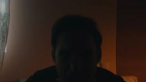 Emotional man screaming while sitting at home Stock Footage 131398306