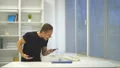 The emotional man throwing the phone on the table. slow motion 4k or 4k+ Resolution