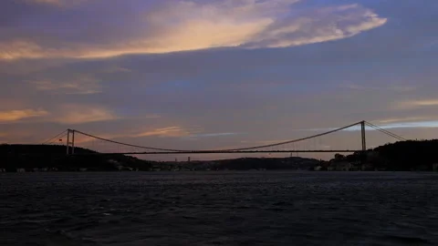 Emotional panorama of cable-stayed bridge across Bosphorus. Sunset sea Stock Footage 253116033