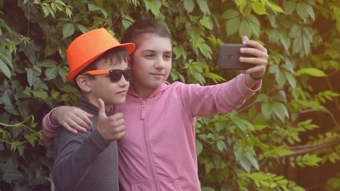 Emotional selfies on a smartphone Stock Footage 131126044