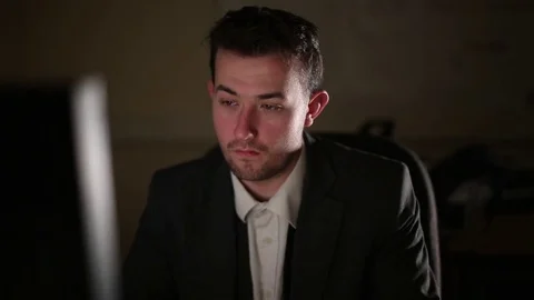 Emotionless Employee Working Late Stock Footage 72057595