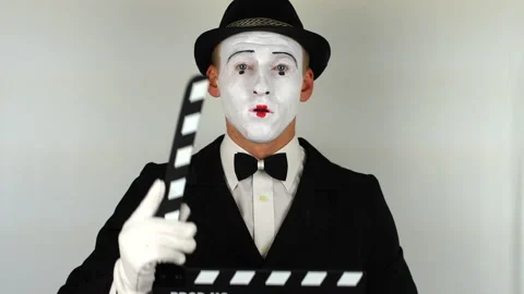 Emotions clown with clapperboard Stock-Footage 86200251