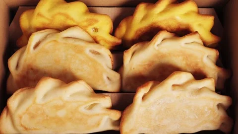 Empanadas in a box with various fillings, concept of pastries and pies. Stock-Footage 323315000
