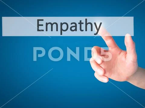 Empathy - Hand pressing a button on blurred background concept o Stock Photos
