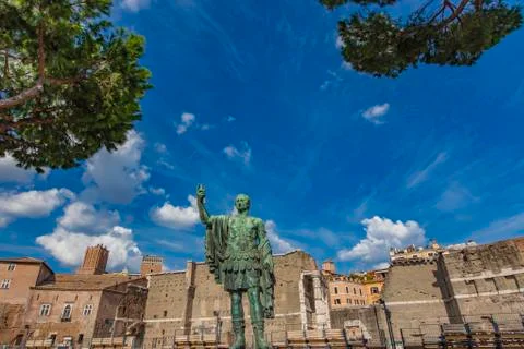 Emperor Julius Caesar Statue in front of Ancient Trajan's Market in Rome Stock Photos