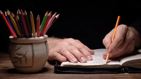 Emphasizing sentences in the Holy Bible Stock Footage 129712331