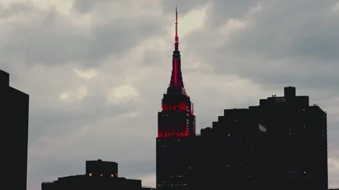 Empire State Building with blinking lights during Manhattanhenge Stock Footage 305428211