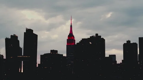Empire State Building with blinking lights during Manhattanhenge Stock Footage 305428220