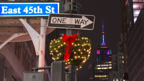 Empire State Building blinks in New Year’s Eve color in New York City Stock Footage 262465380
