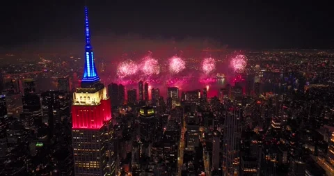Empire State Building Lit Red, White, and Blue 4th of July Fireworks Aerial Stock Footage 245367385