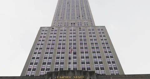 Empire State Building in Manhattan, New York City. Panning down movement Stock Footage 215875161