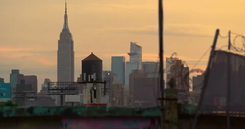 Empire State Building In NYC At Sunset With Barbed Wire Fence In Foreground Stock Footage 199647698