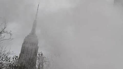Empire State Building through NYC smoke Video stock 60404080