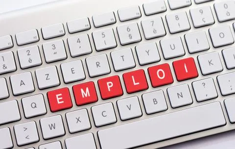 EMPLOI writing on white keyboard Stock Photos