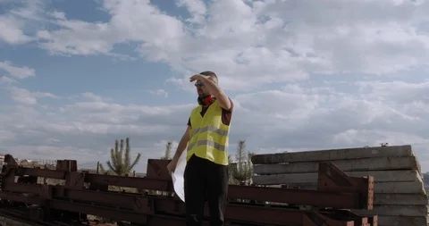 An employee, architect, checks the planning of the work done. Stock Footage 127121422