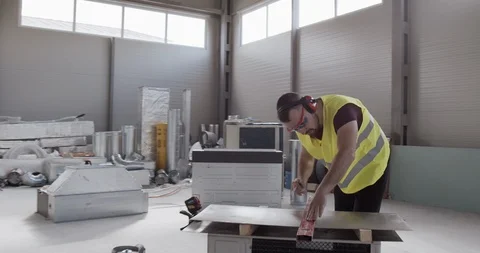 An employee, architect, checks the planning of the work done. Stock Footage 127172622