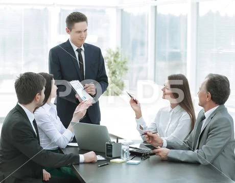 Employee of the company providing new ideas of business development at a Stock Photos