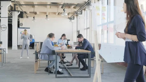 The employee completed the preparation for the presentation on the glass board Stock Footage 109503729
