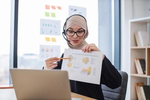 Employee decoding charts on online briefing using devices Stock Photos
