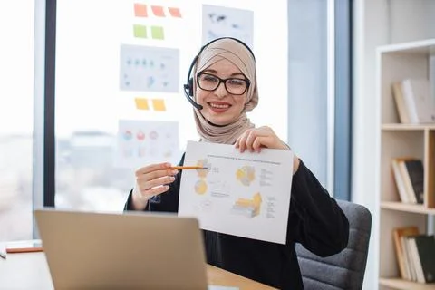 Employee decoding charts on online briefing using devices Stock Photos
