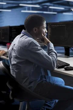 Employee doing IT infrastructure management in data center 스톡 사진