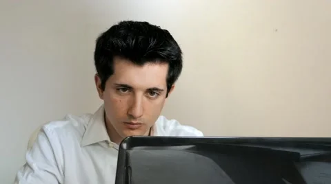 Employee drinks coffee in front of the pc Stock Footage 61502285