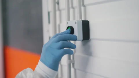 An employee enters the warehouse Stock Footage 145689110