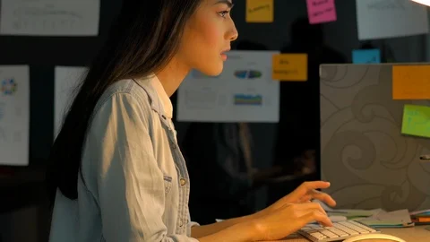 Employee female hard working with computer to late night at office. Stock Footage 106865141