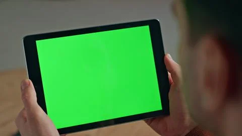 Employee hands using chromakey tablet in office closeup. Man looking screen Stock Photos