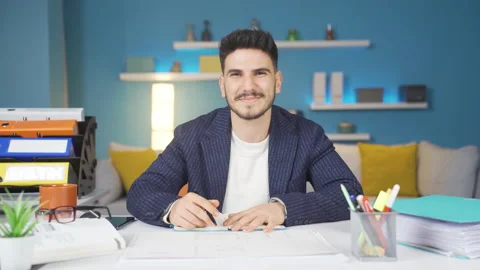 Employee looking at camera and making positive gesture during work. Stock Footage 237057584