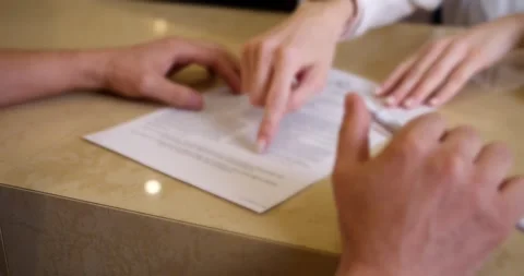 Employee offers a document or contract for signature Stock Footage 266915158