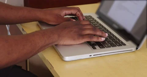 Employee in office typing on a computer Stock Footage 184979841