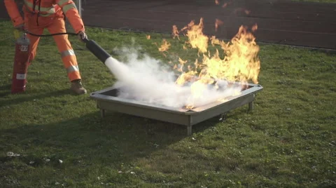 An employee performs a fire drill, slow motion. Stock-Footage 57624995