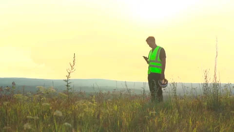 An employee with a phone communicates in a messenger, a pause in work Stock Footage 247189540