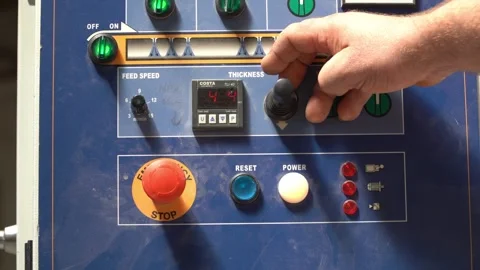 Employee Pressing a Button on a Machine Stock Footage 293541717