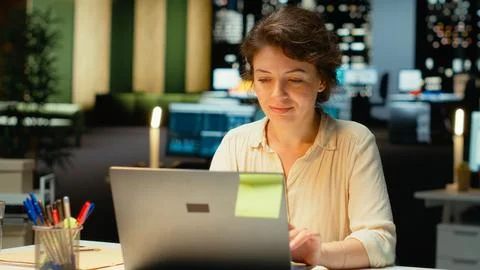 Employee proofreading and fact checking financial data Stock Photos