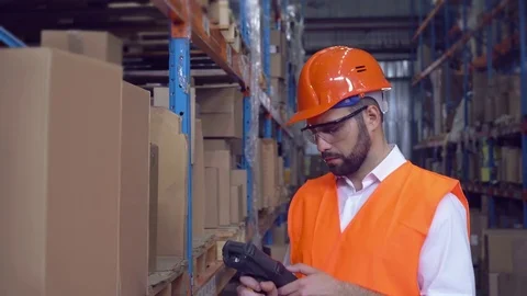 Employee scans the bar code Video stock 77437401