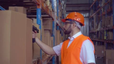 Employee scans the bar code Stock Photos