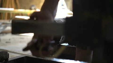 Employee Scrolls Through a Long Video at The Sawmill,sawdust Clogged Stock Footage 76641645