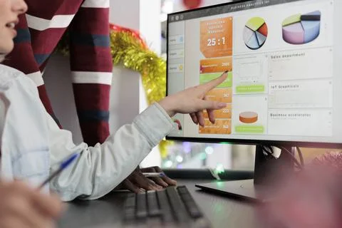 Employee showing data on computer screen Stock Photos