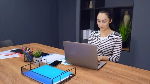 Employee in startup company use computer Stock Footage 104833906