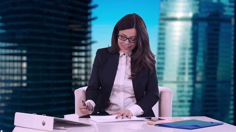 The employee takes the signed documents from the Directors of the company. Stock-Footage 81486947