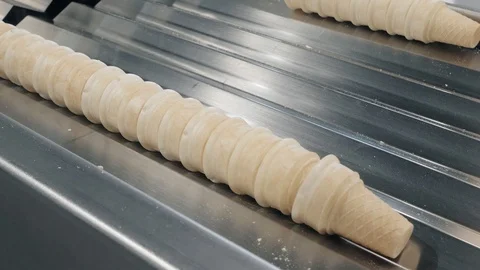 Employee takes waffle cups stack for packaging closeup Stock Footage 124170134