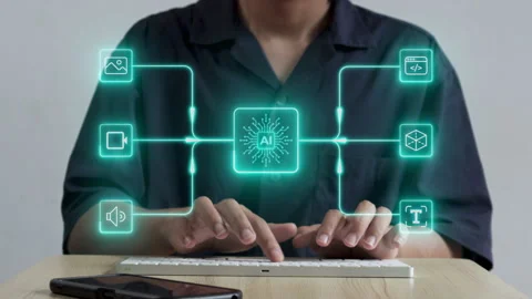 Employee typing on laptop with artificial intelligence network Stock Footage 345843829