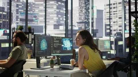 Employee using AI technology to design machine learning algorithms Stock Footage 318238865