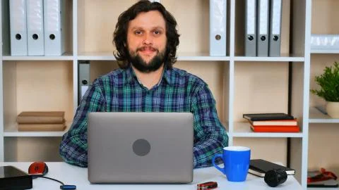 Employee using computer indoors 스톡 사진