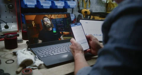 Employee Watching Online Trading Tutorial on Laptop, Checking Real-Time Stocks Stock Footage 310117819