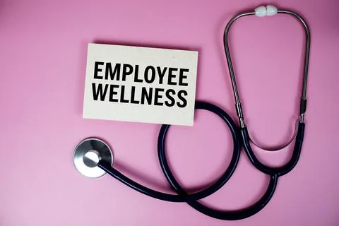 Employee Wellness program  text with stethoscope on pink background, Health.. 스톡 사진